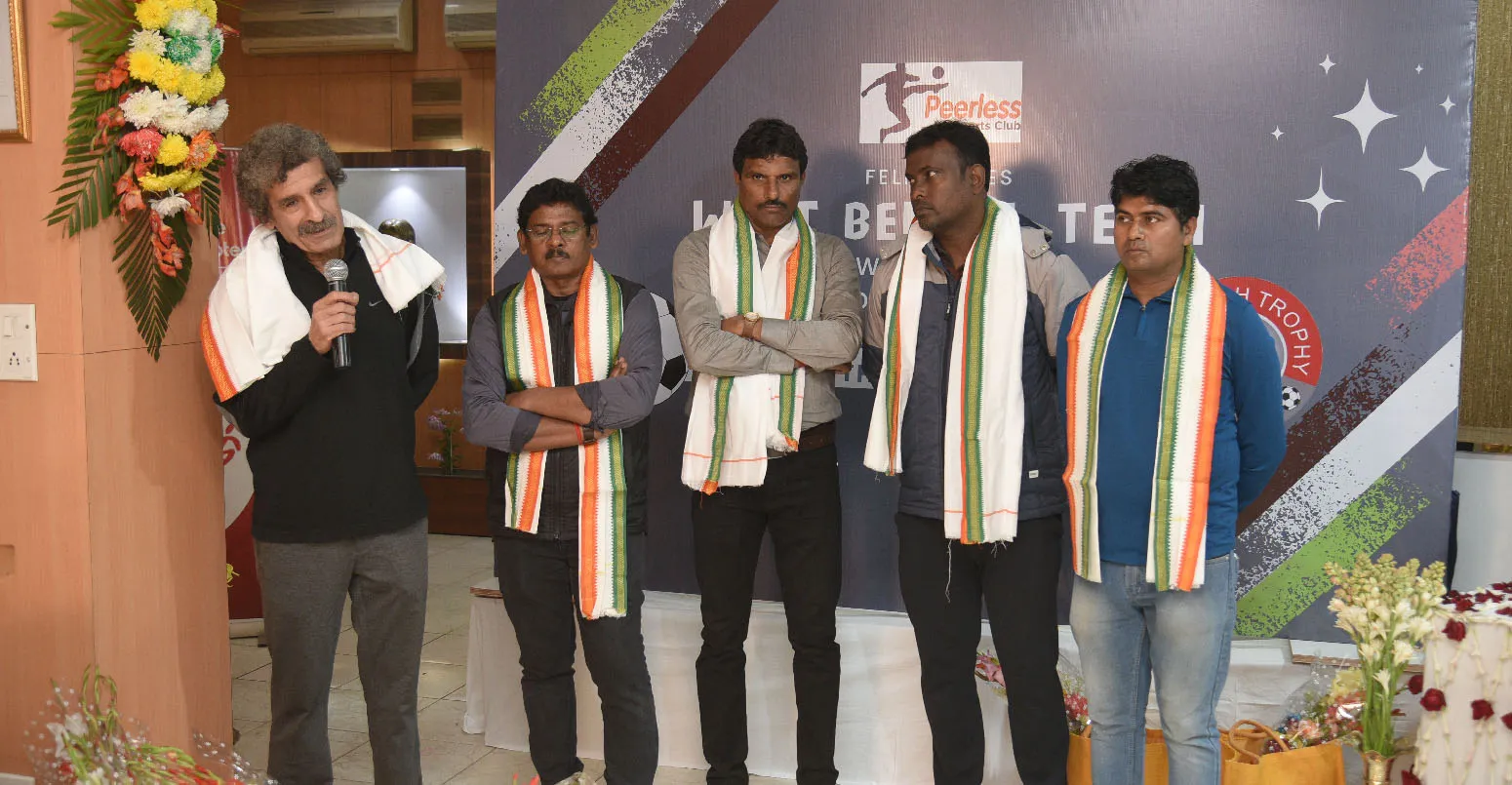 Jamshed Nasiri, Hemanta Dora and the other coaching staff of Peerless Sports Club congratulating the four players who represented the club